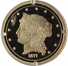 Zlatá medaile s námětem americké 50 dolarové mince 1877